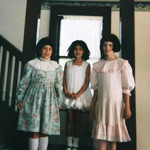 gumm sisters standing on the stairs